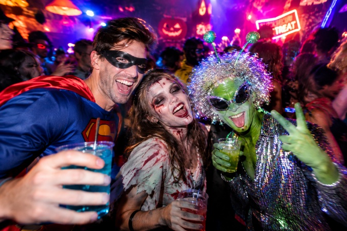 friends enjoying a halloween costume party