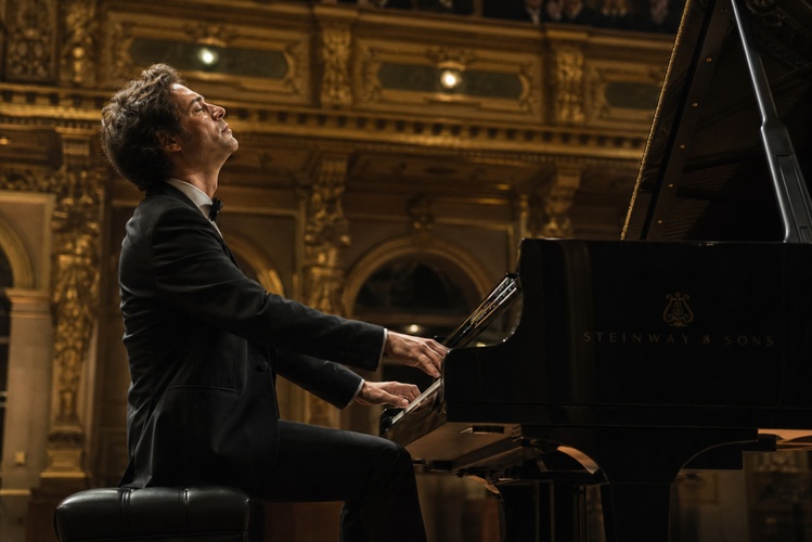 classical pianist in a concert hall